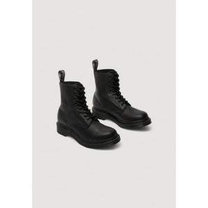 Dr. Martens black pebbled leather lace-up boots with tonal laces, matching sole, and signature branded heel tabs.