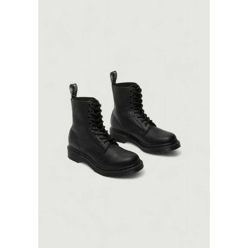 Dr. Martens black pebbled leather lace-up boots with tonal laces, matching sole, and signature branded heel tabs.