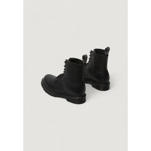 Black, pebbled leather Dr. Martens lace-up boots with tonal black soles and branded heel pull tabs.
