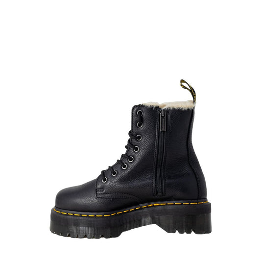 Dr. Martens black leather lace-up boot with side zipper, faux fur lining, and thick lugged platform sole.