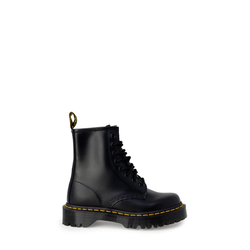 Black leather lace-up boot with a thick lug sole, yellow welt stitching, and a signature yellow-and-black heel loop.