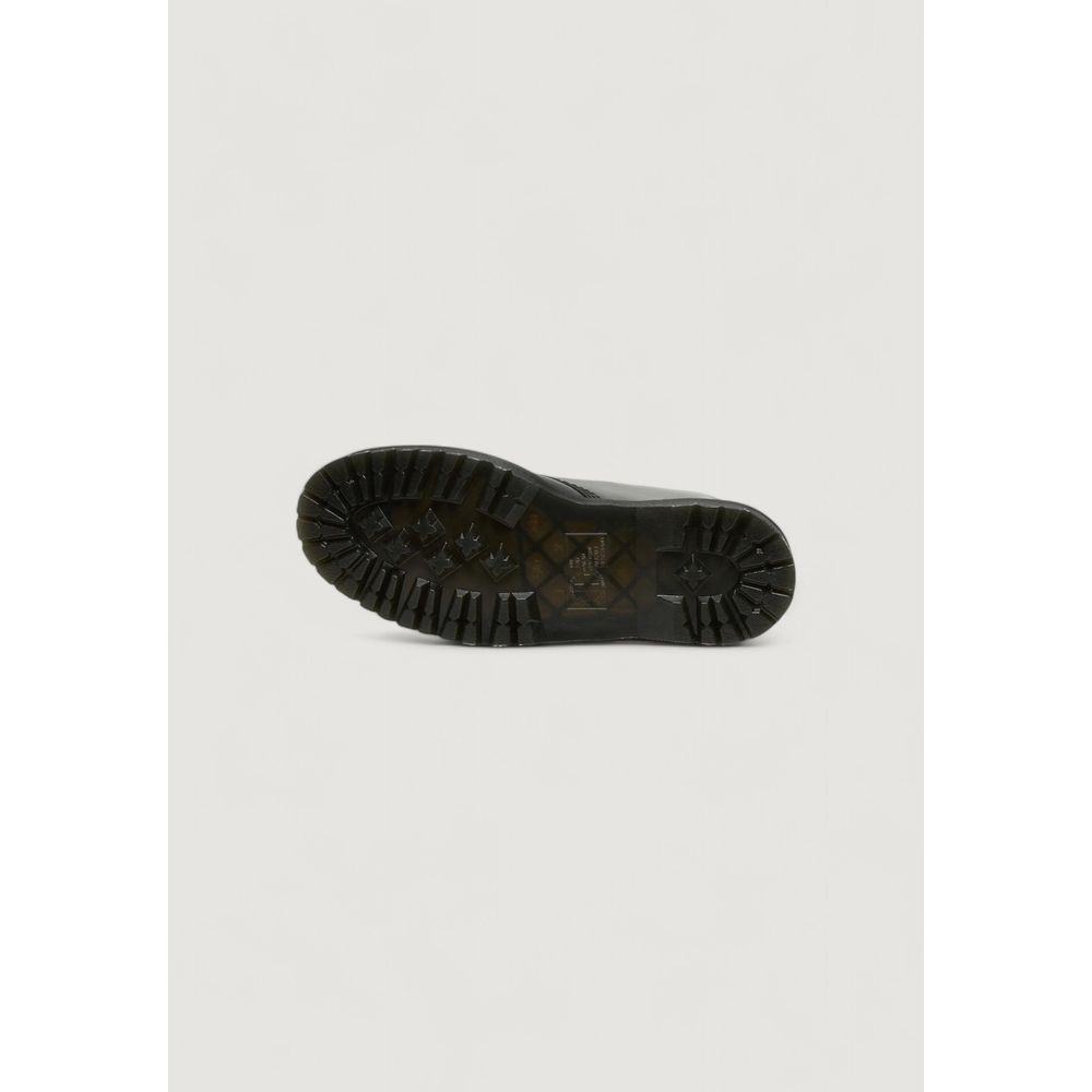 Black Dr. Martens leather lace-up boot viewed from the bottom, showing the signature thick, grooved rubber lug sole.