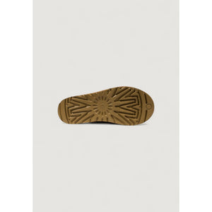 UGG beige boot sole with zig-zag tread pattern.