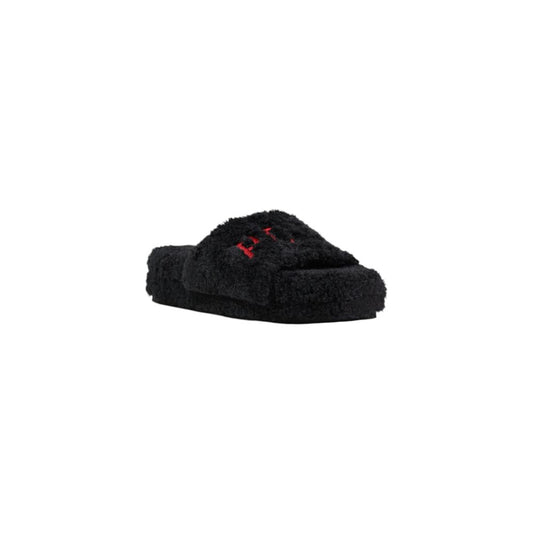 Ralph Lauren black faux-fur slide slippers featuring a plush textile texture and red logo embroidery.