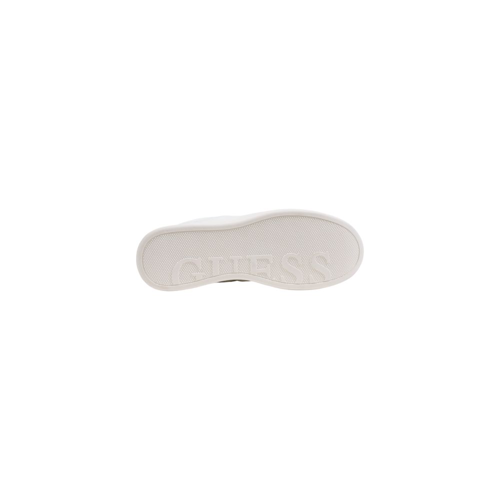 White Guess platform sneaker, showcasing the flat, textured rubber outsole with embossed branding.