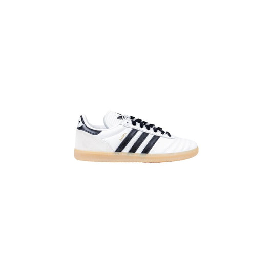 Adidas Samba sneaker in white faux leather with black stripes, black heel tab, and a gum rubber sole.