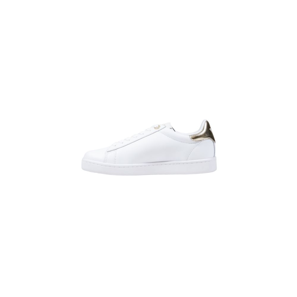 White leather low-top sneaker with a metallic gold heel tab and tonal white laces and sole.