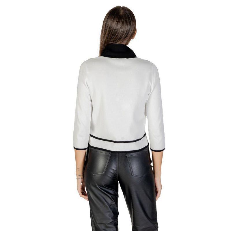 White viscose sweatshirt with black collar and hem trim viewed from behind