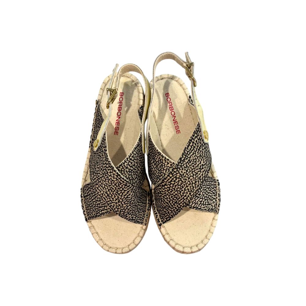 Borbonese beige and black animal print textile slingback espadrille sandals with ankle strap and buckle closure.