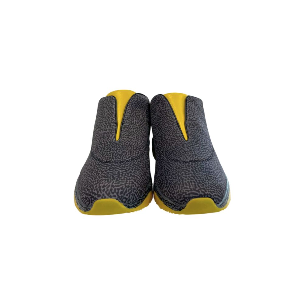 Borbonese slip-on sneakers in black and grey textured leather with vibrant yellow accents and thick yellow soles.