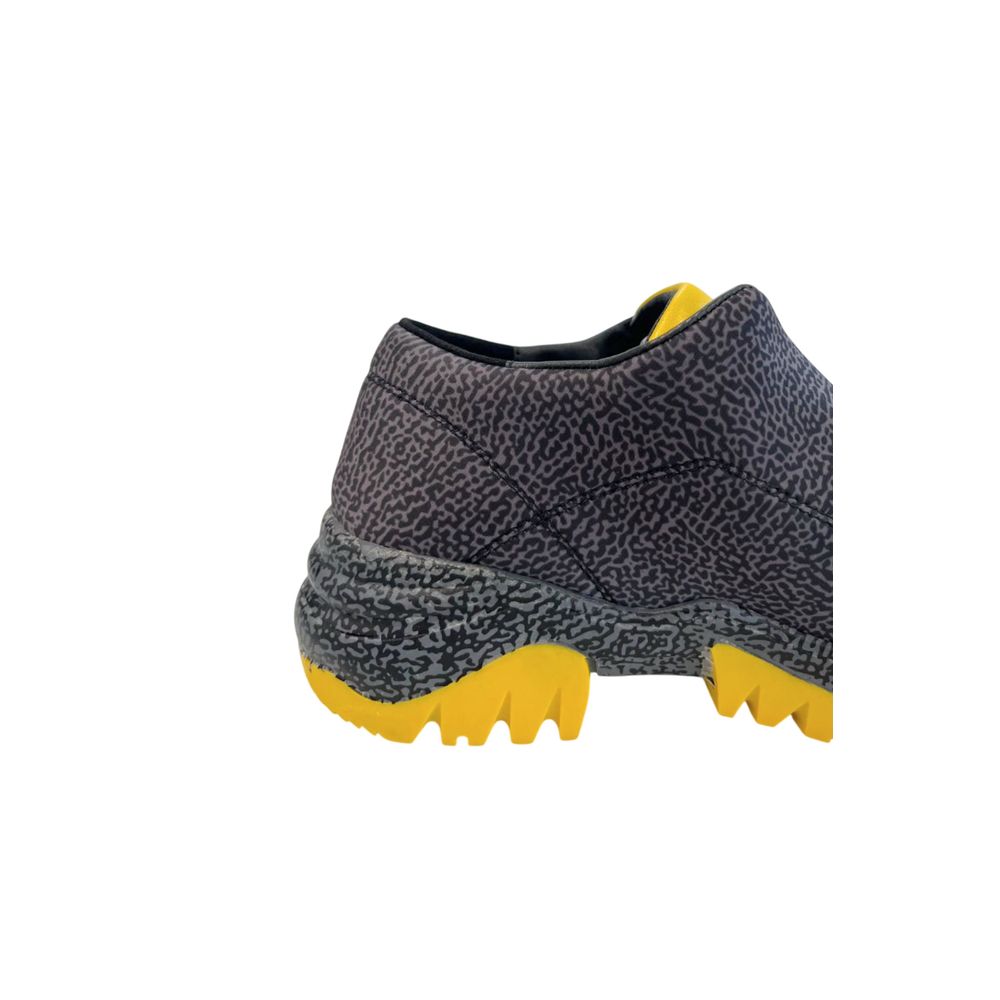 Borbonese women's sneaker in black and gray animal print leather with a thick, jagged yellow rubber sole.