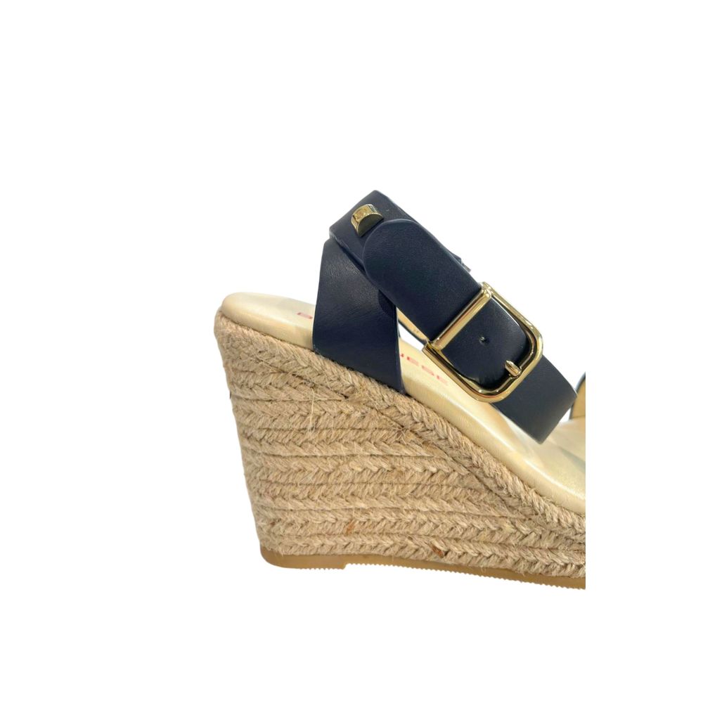 Borbonese women’s navy blue leather wedge sandal with an ankle strap, gold buckle, and woven jute espadrille platform.