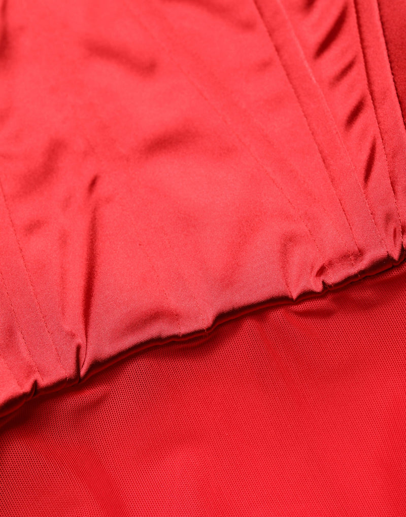 Red satin corset style top with boning and mesh overlay detail