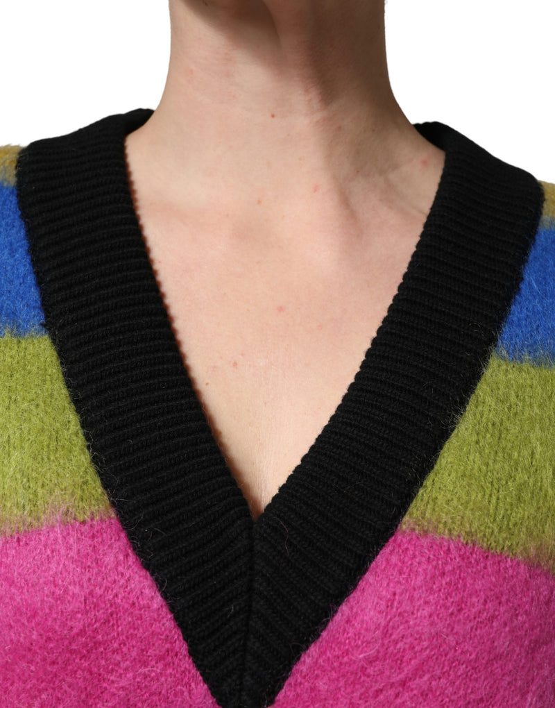 Fuzzy wool pullover sweater with blue, green, and pink stripes and a black ribbed V-neck collar