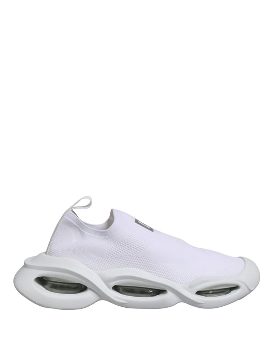 Dolce & Gabbana white knit slip-on sneakers with a chunky, futuristic sculptural rubber sole and visible air units.