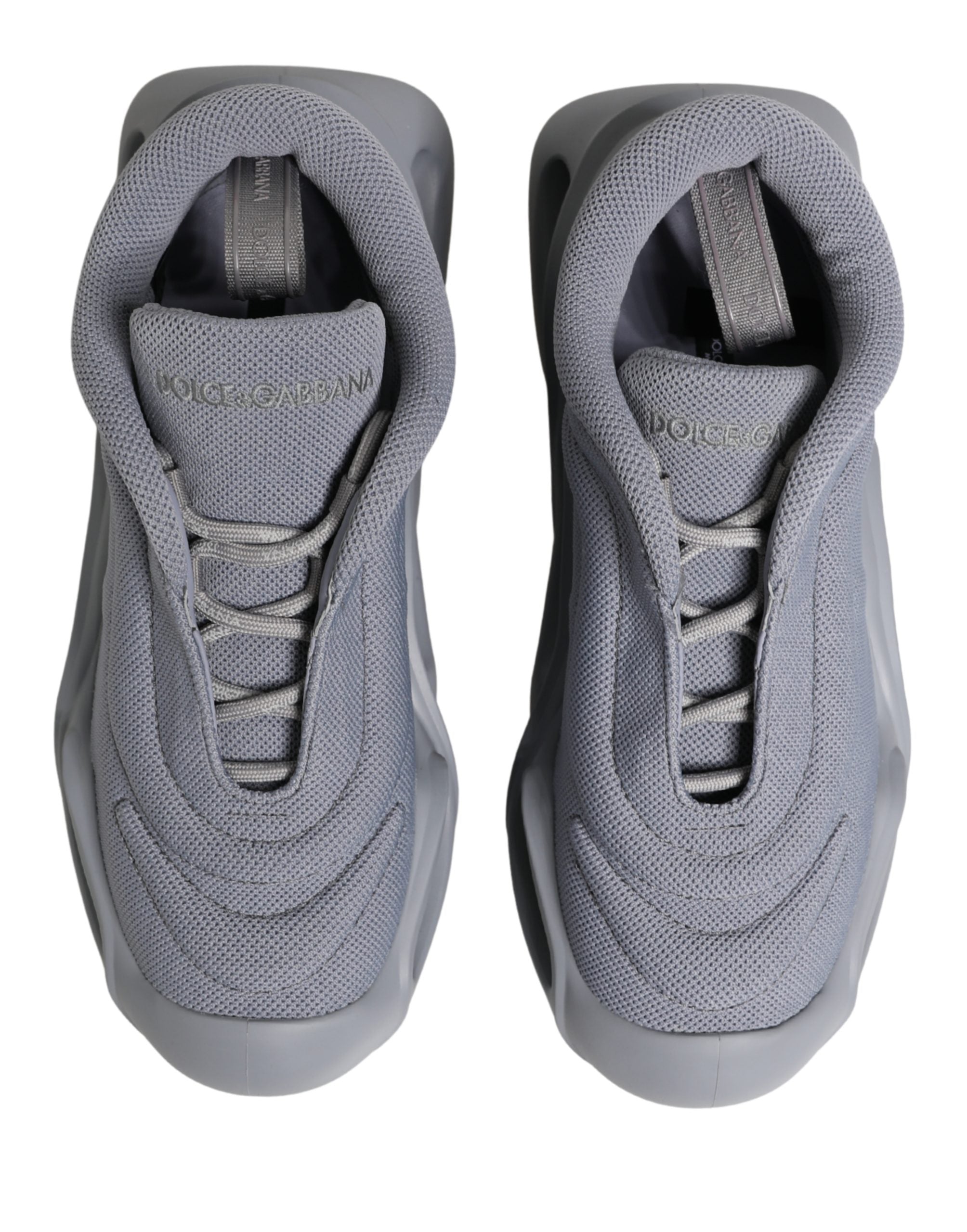 Dolce & Gabbana gray slip-on wave low-top sneakers in technical mesh with sculpted, chunky rubber soles.