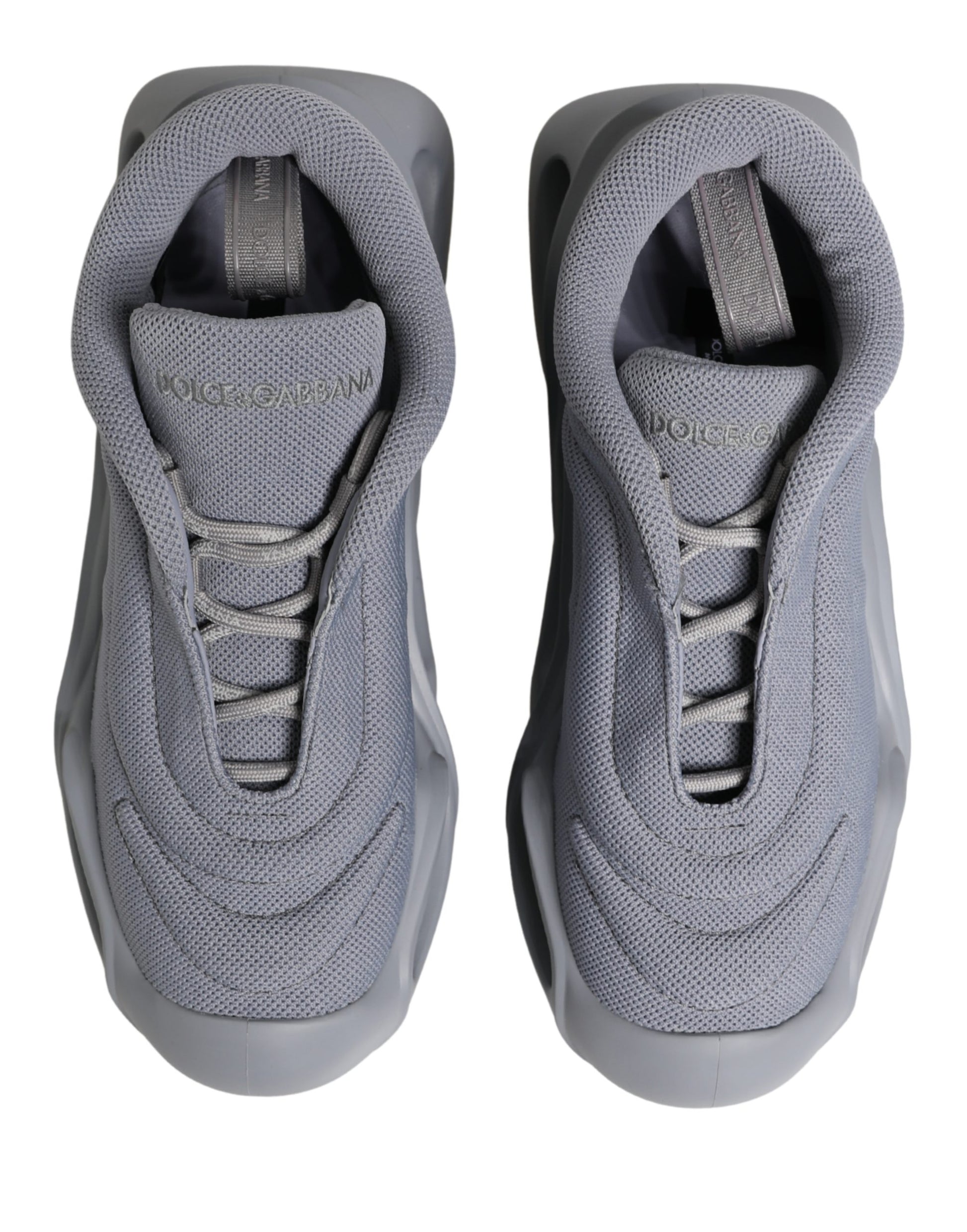 Dolce & Gabbana gray slip-on wave low-top sneakers in technical mesh with sculpted, chunky rubber soles.