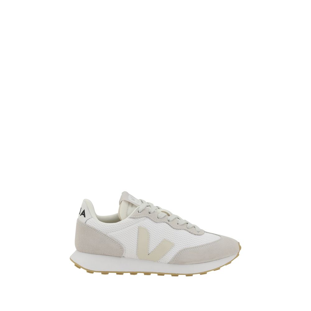 White and beige Veja running-style sneaker in mesh and suede with a V logo and textured gum sole.