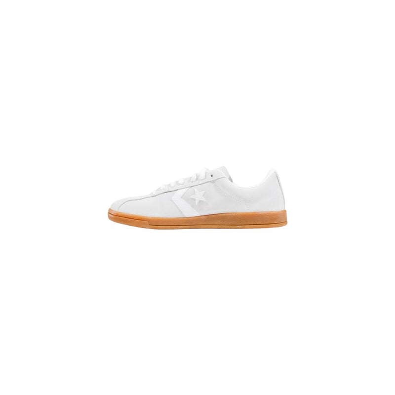 White leather low top sneaker with a gum sole and star chevron logo