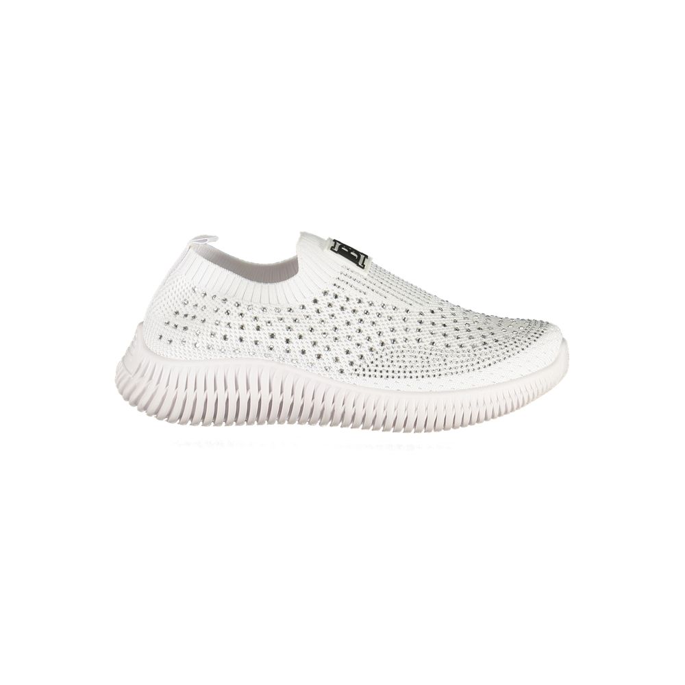 White slip-on sneaker with textured sole on a white background