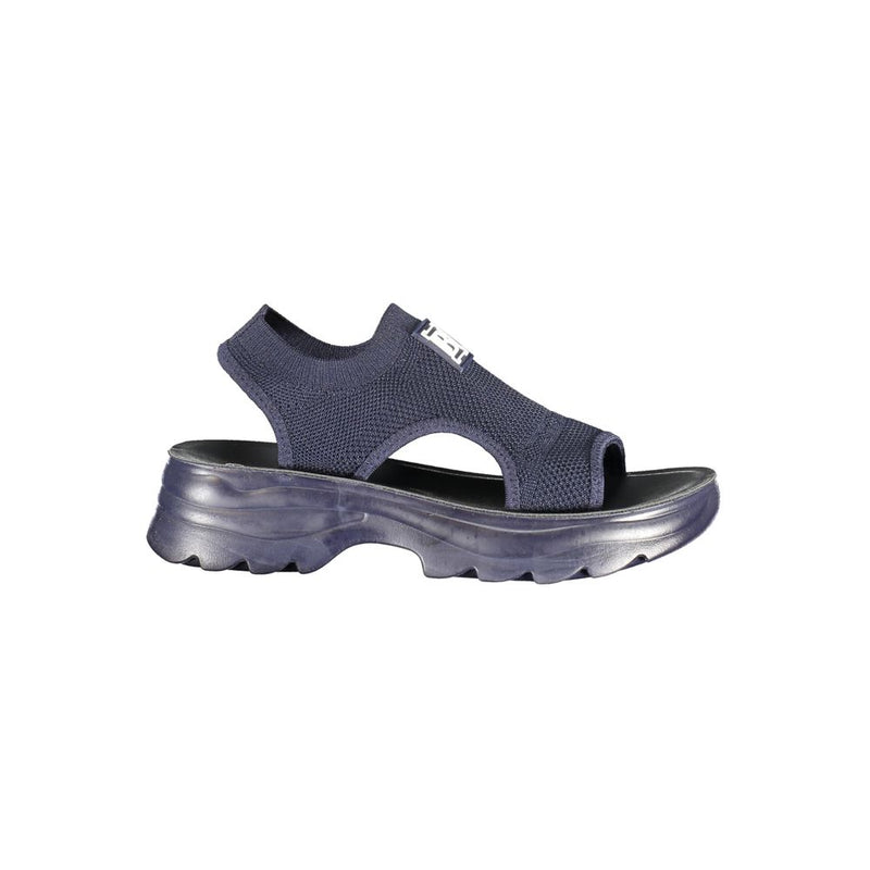 Blue knit polyester platform sandal with a chunky lug sole and branded strap detail