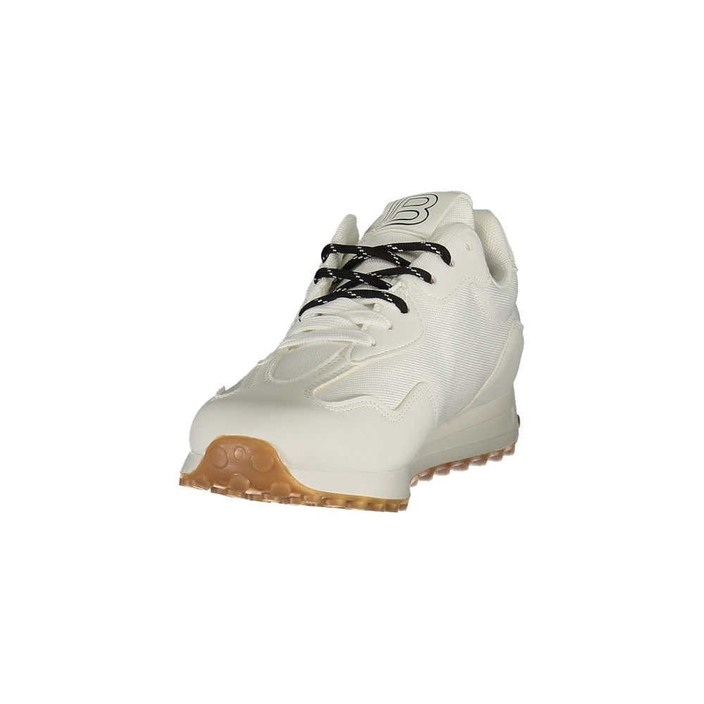 White sneaker with black laces on a white background