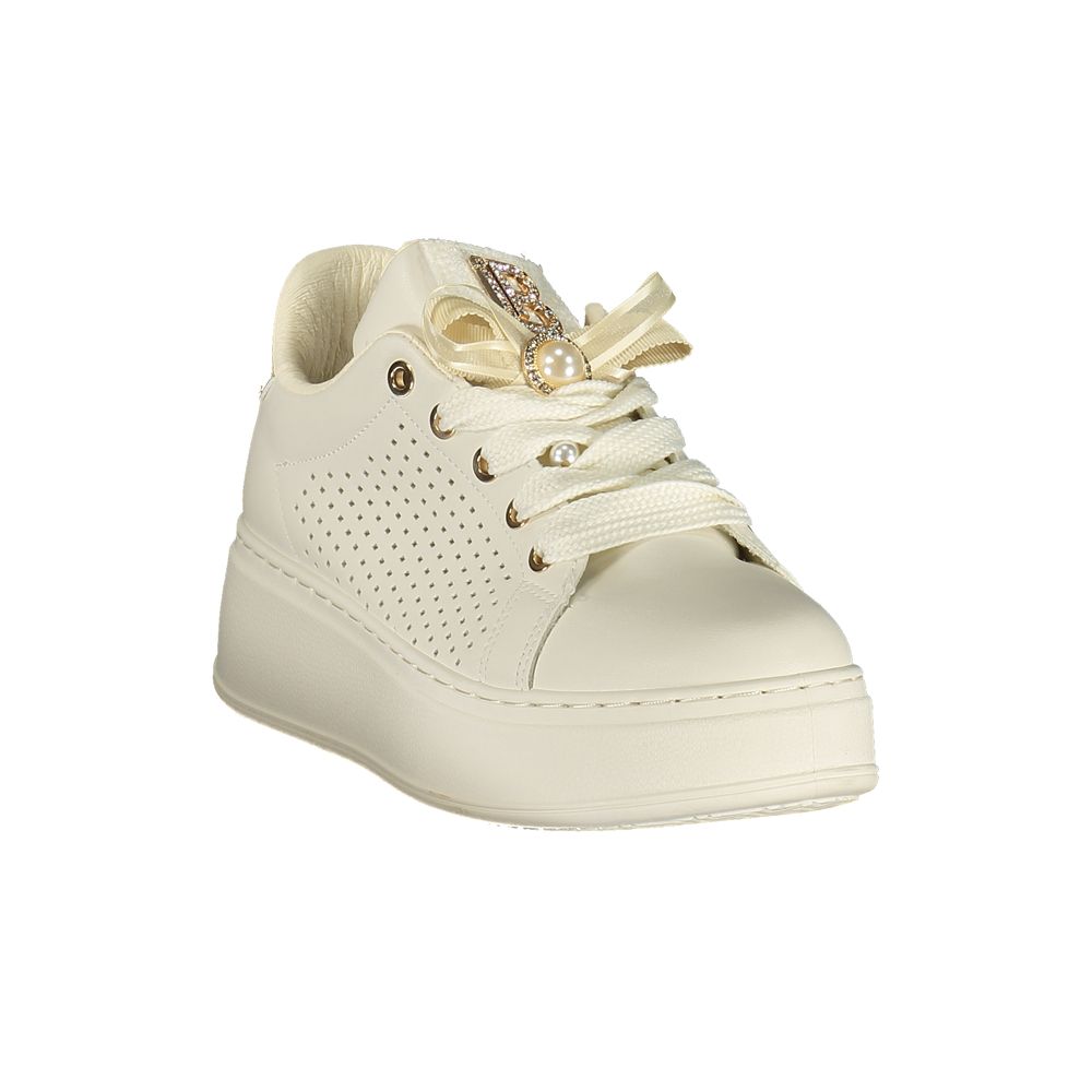 White polyurethane Laura Biagiotti platform sneaker with a perforated side, satin ribbon, and pearl embellishment.