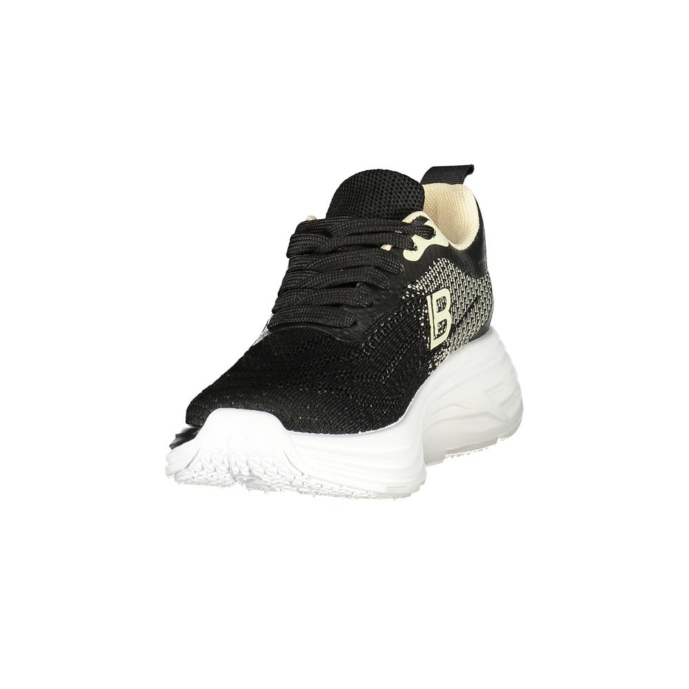 Black sneaker with white sole on a white background