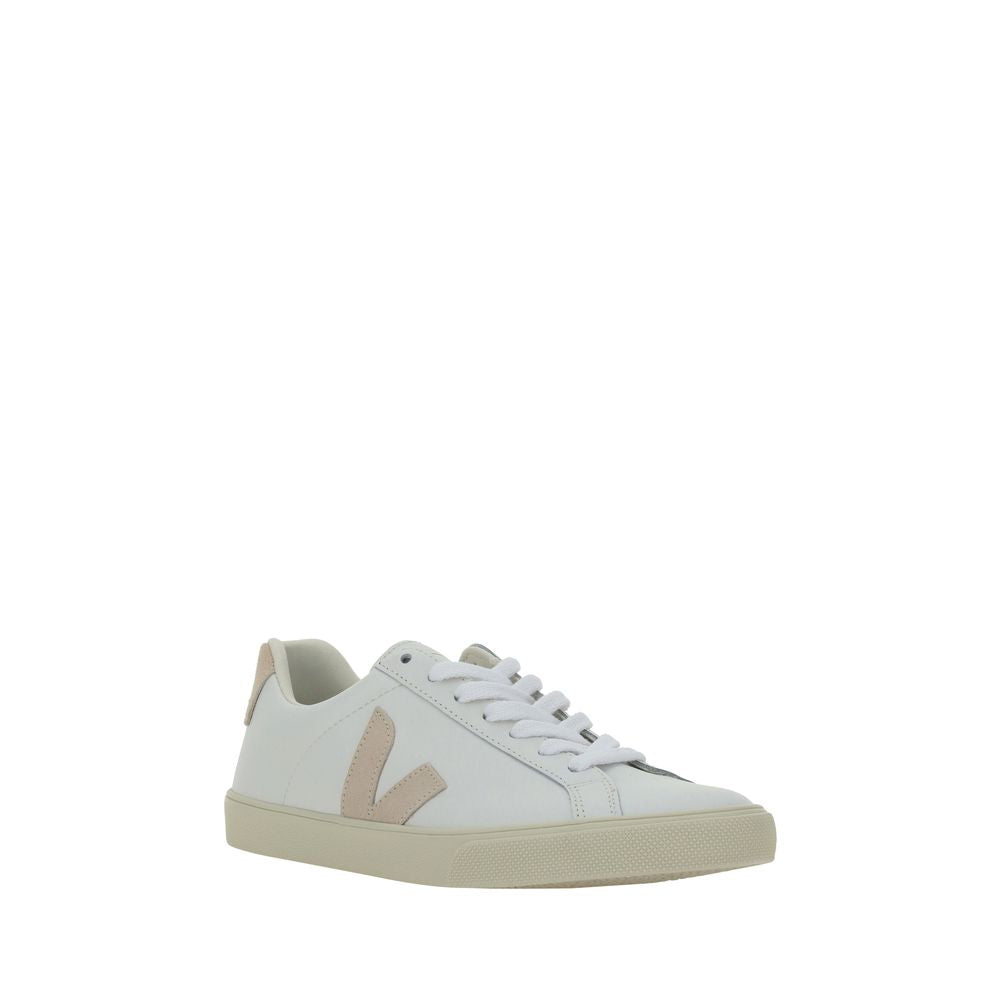 Veja white leather low top sneaker with beige V logo and heel tab, flat laces, and textured rubber sole.