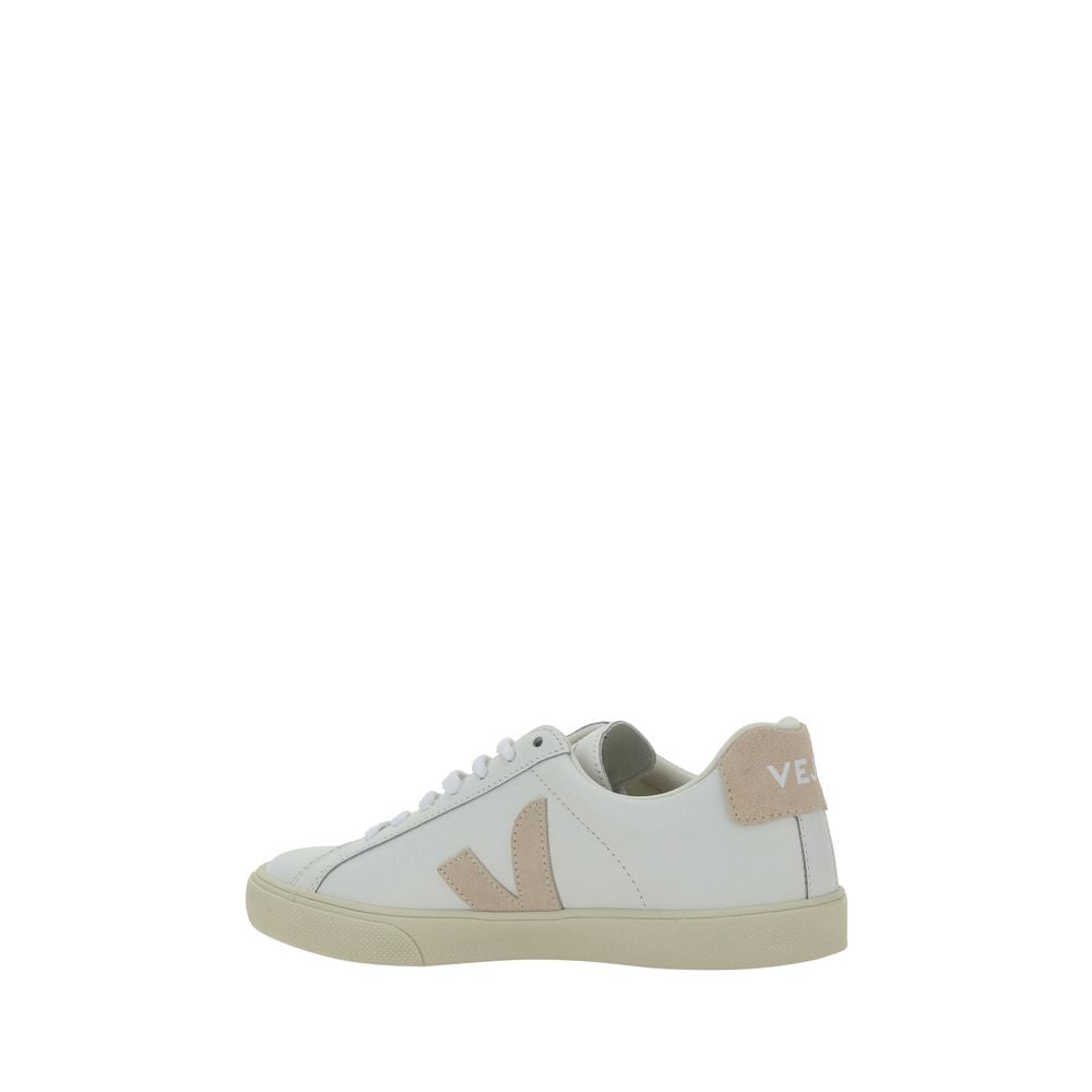 Veja white leather low-top sneaker with beige V logo and heel tab, white laces, and flat rubber sole.