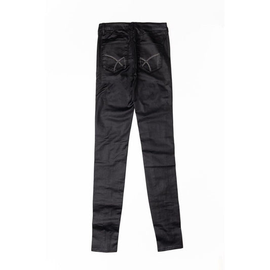 Back view of black cotton skinny jeans with embroidered back pockets
