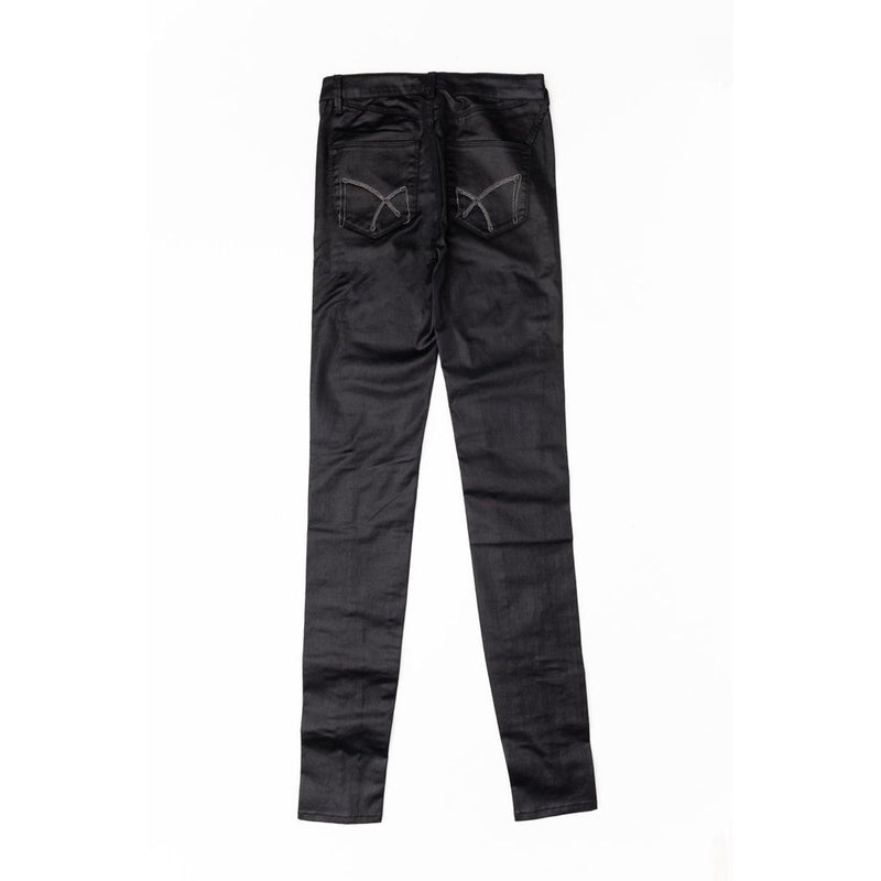Back view of black cotton skinny jeans with embroidered back pockets