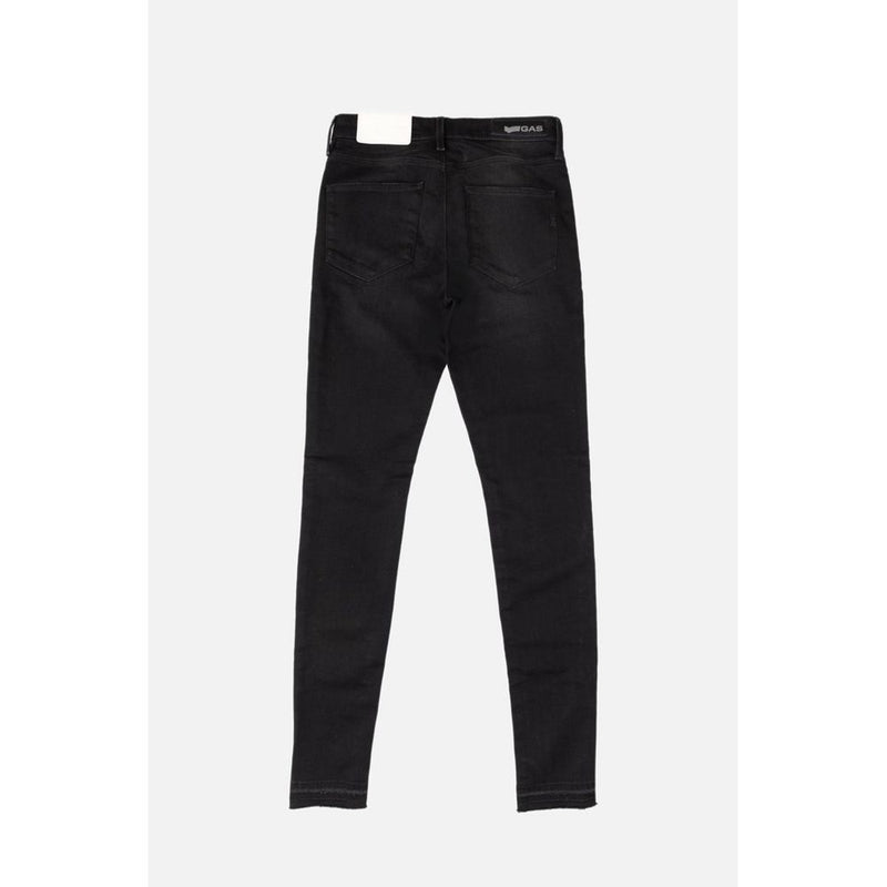 Black cotton skinny jeans viewed from the back