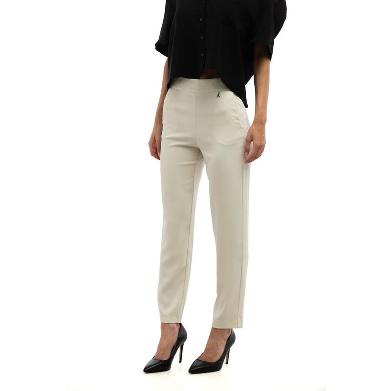 Patrizia Pepe gray polyester casual pants worn with a black blouse and heels