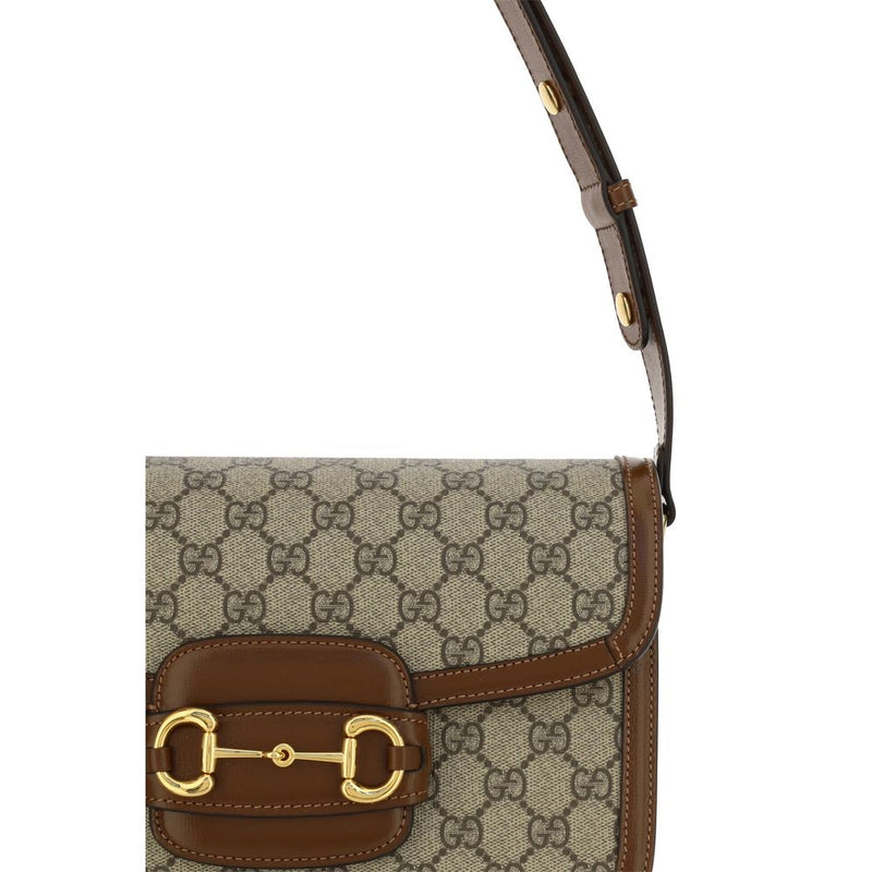 Beige and brown monogram canvas Gucci shoulder handbag with gold horsebit hardware