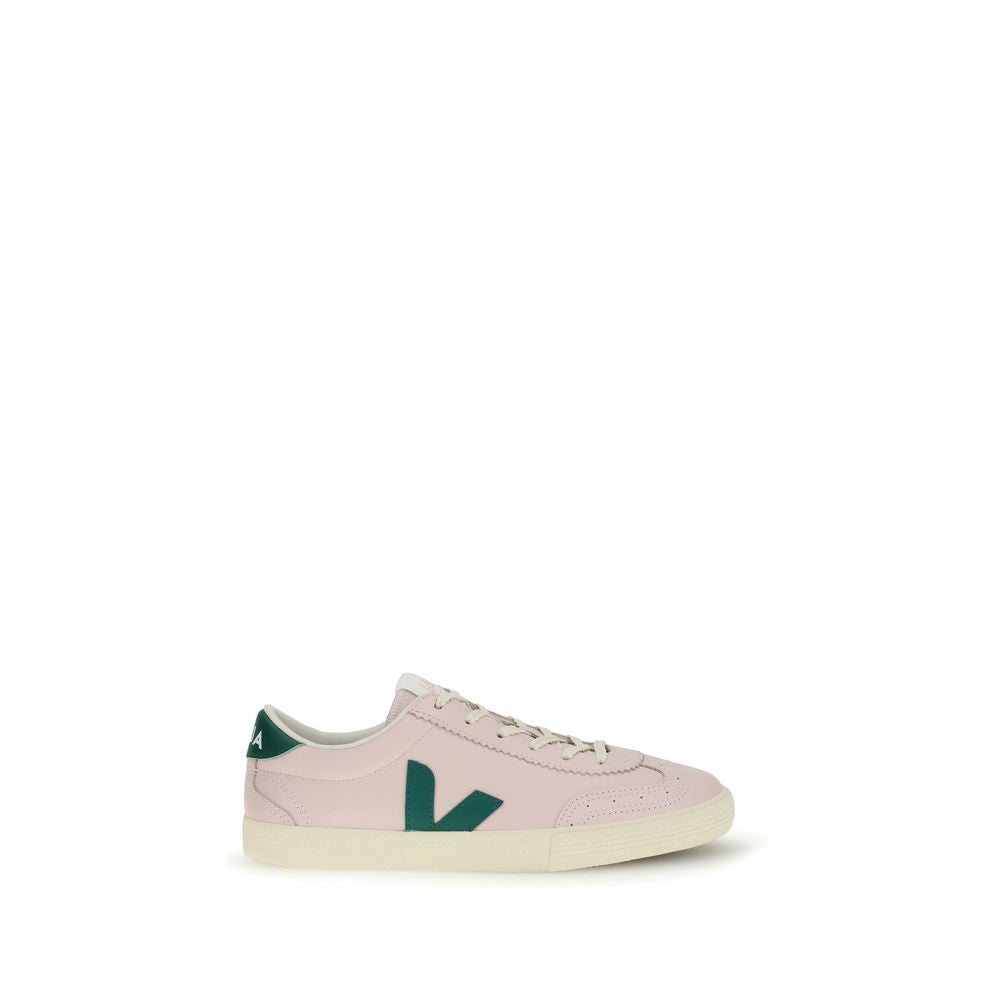 Veja low-top sneakers in pale pink leather with dark green side logos, contrasting heel tab, and off-white rubber sole.
