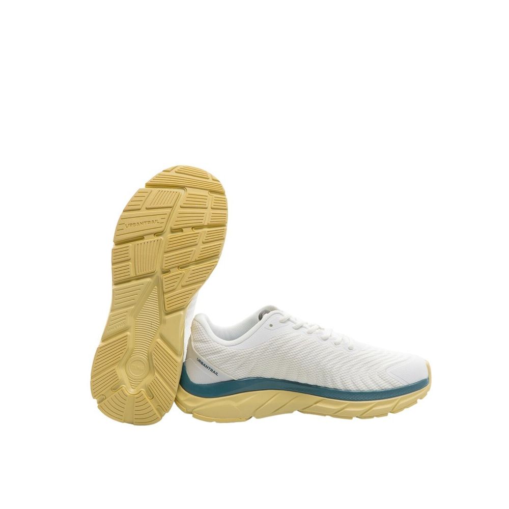 Female model wearing Colmar bicolor polyester athletic sneakers with a bold two-tone upper, sporty athletic silhouette, and lightweight performance construction, captured mid-step in a casual lifestyle pose showcasing the sneaker's dynamic color contrast and active sport style.