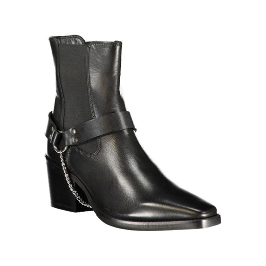 Cafenoir black leather ankle boot with a block heel, silver chain detail, and a harness strap style.
