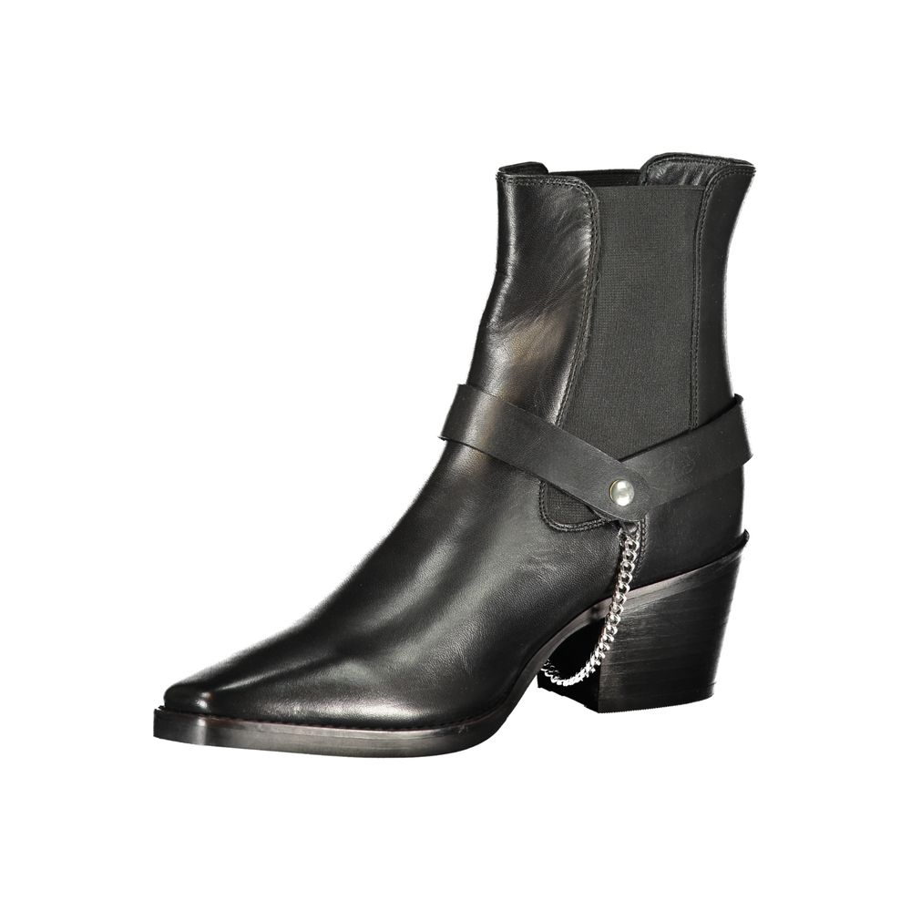 Cafenoir black leather ankle boot with side elastic panel, a strap, and a silver chain detail on a stacked block heel.