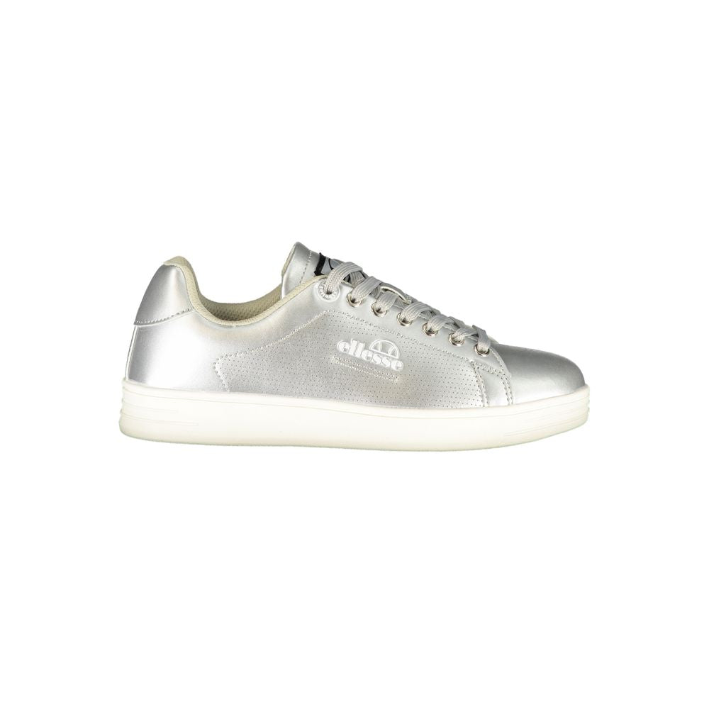 Metallic silver polyurethane Ellesse sneaker with a perforated side panel, lace-up closure, and flat white rubber sole.
