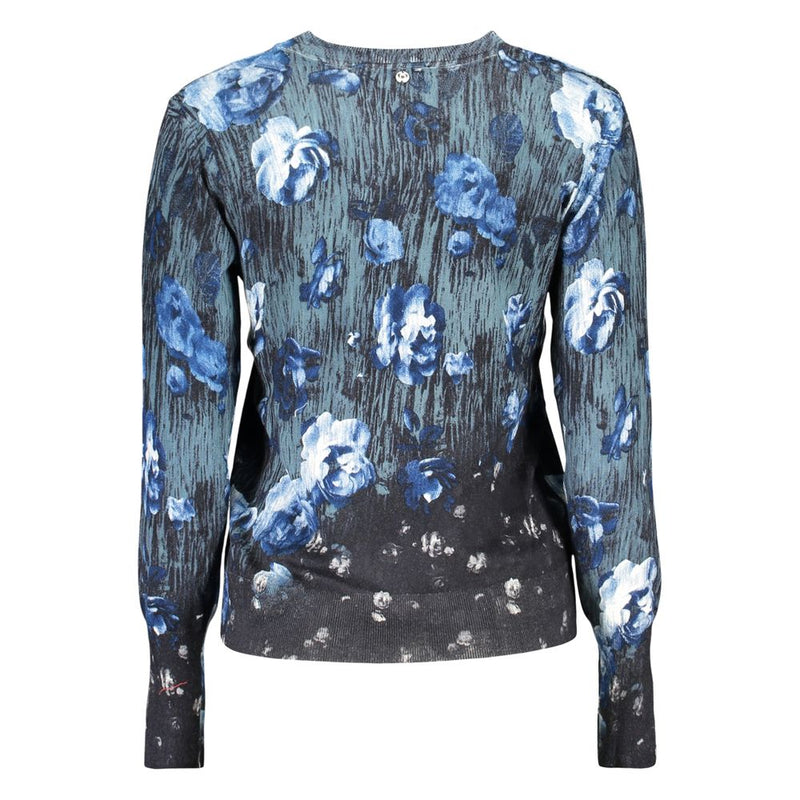 Blue viscose women's long-sleeve sweater with a dark floral print and ribbed cuffs