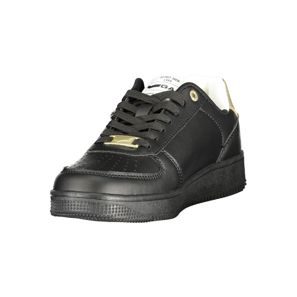 Black sneaker with gold accents on a white background