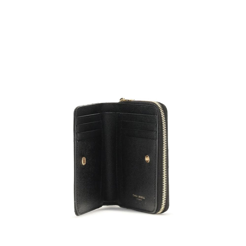 Open black leather wallet with card slots and a gold zipper