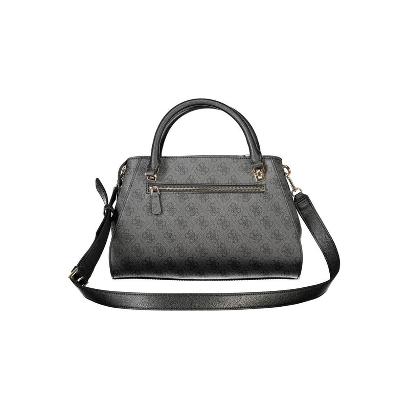 Black polyurethane Guess handbag with top handle, monogram pattern, and detachable shoulder strap