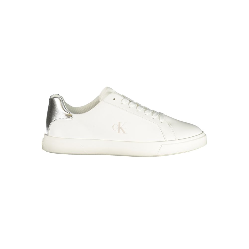 White polyurethane Calvin Klein women’s sneaker with silver heel accent and CK logo branding.