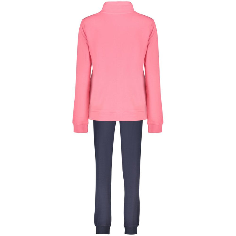Pink cotton women's zip-up sweatshirt seen from the back paired with dark trousers