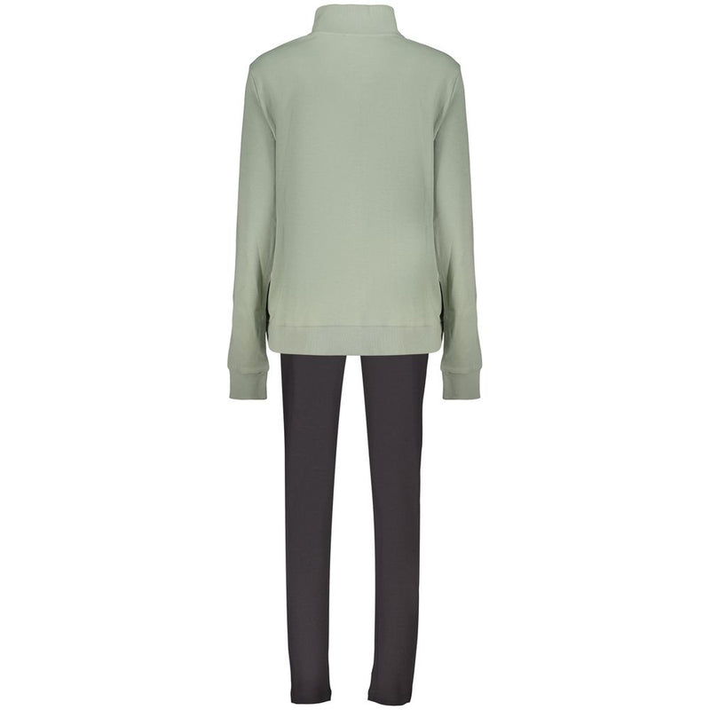 Back view of a green cotton women sweatshirt with a mock neck, paired with dark pants