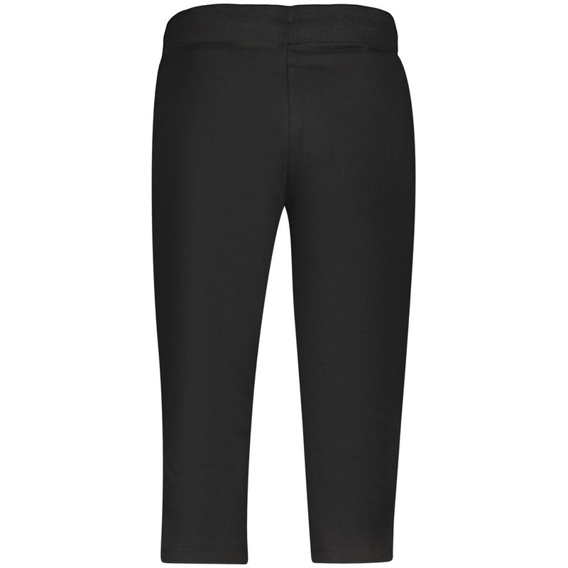 Black cotton women's cropped pants with elastic waistband shown from the back