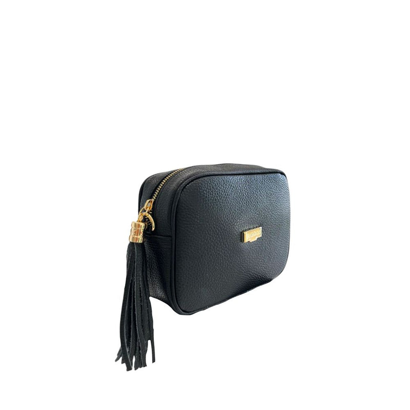 Black leather crossbody bag with gold hardware and tassel zipper pull