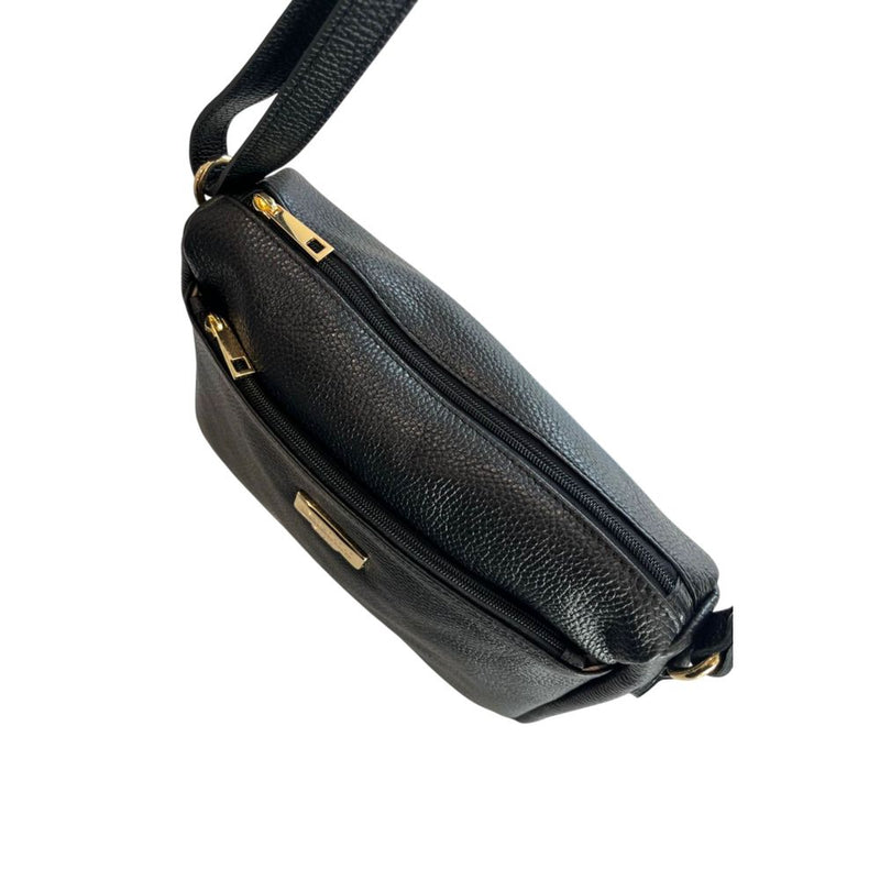 Black leather women's crossbody bag with zippered compartments and gold hardware